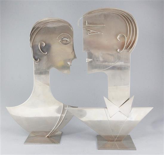 Franz Hagenauer (1906 - 1986). An impressive pair of chrome plated metal busts of a lady and gentleman, height 20in.